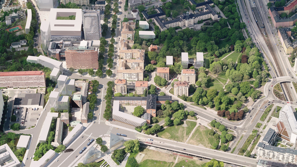 Flygvy över området med ny bebyggelse, illustration.
