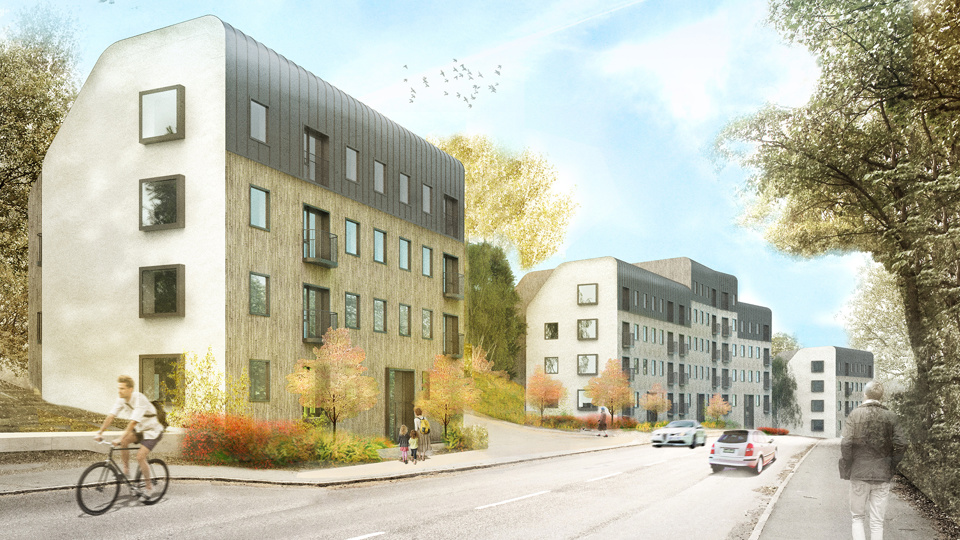 En väg med bilar, cyklist och människor bredvid flerbostadshus.