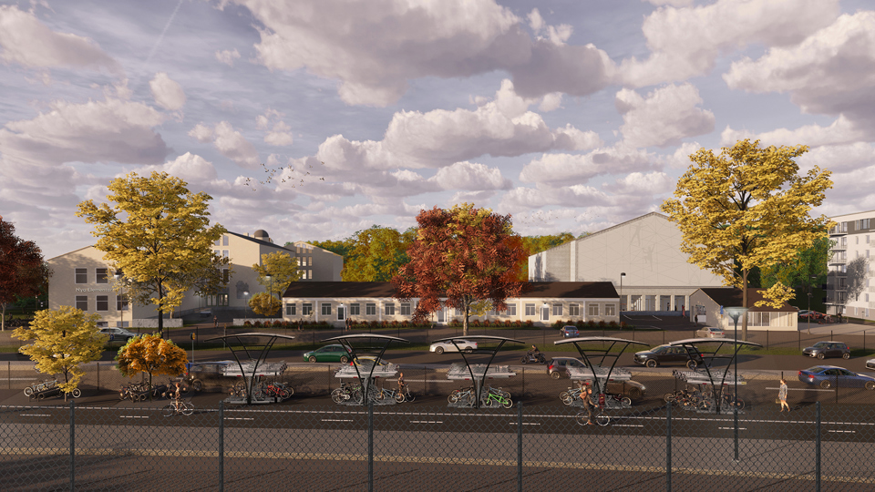 Vy sett från Åkeshovs tunnelbaneperrong, söder om planområdet, som visar föreslagen bebyggelse i relation till befintlig, cykelparkering, illustration.
