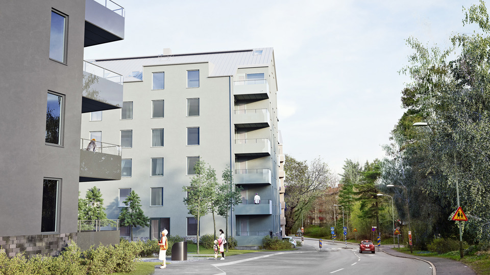 Bostadshus längs en lätt trafikerad gata.