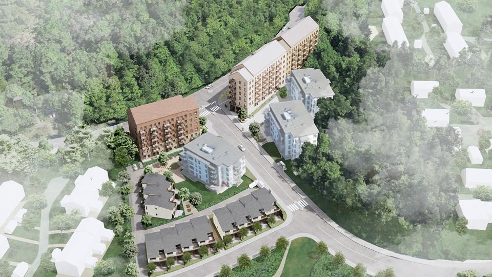 Flygvy från sydväst över det föreslagna flerbostadshuset vid Magelungsvägen och radhusen vid Skrattmåsvägen.