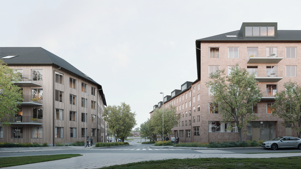 Två flerbostadshus och gata med trädplanteringar. 