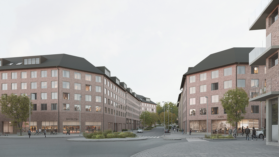 Bild av två kvarter i tegel längs en stadsgata. 