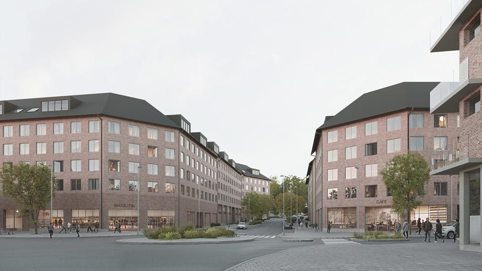 Bild av två kvarter i tegel längs en stadsgata. 