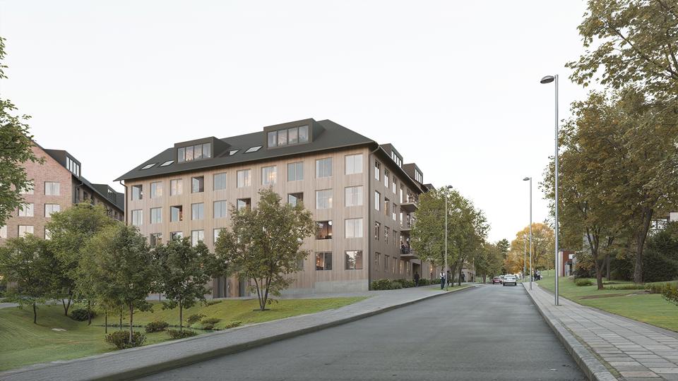 Flerbostashus i tegel vid grön innergård och gata. 