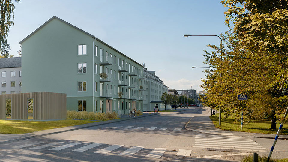 Bostadshus vid en t-korsning med övergångsställen. På andra sidan om bostadshusen syns träd och gräsmatta. Illustration
