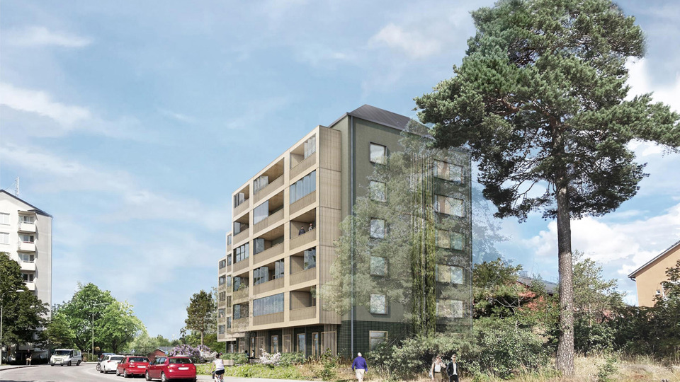 Ett grönt hus i sex våningar med träfärgade balkonger. Människor som går förbi på gatan.