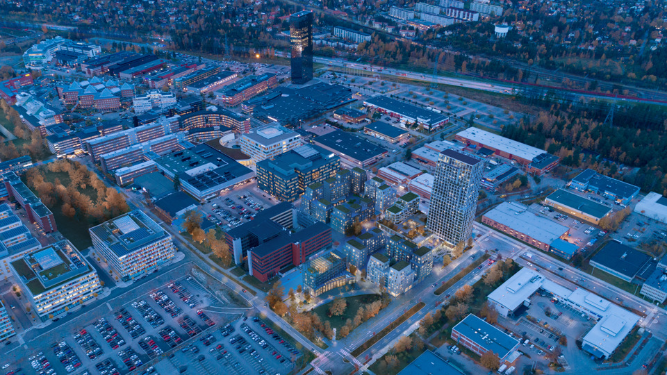 Flygvy över området med planförslaget i förhållande till omgivningen, fotomontage.