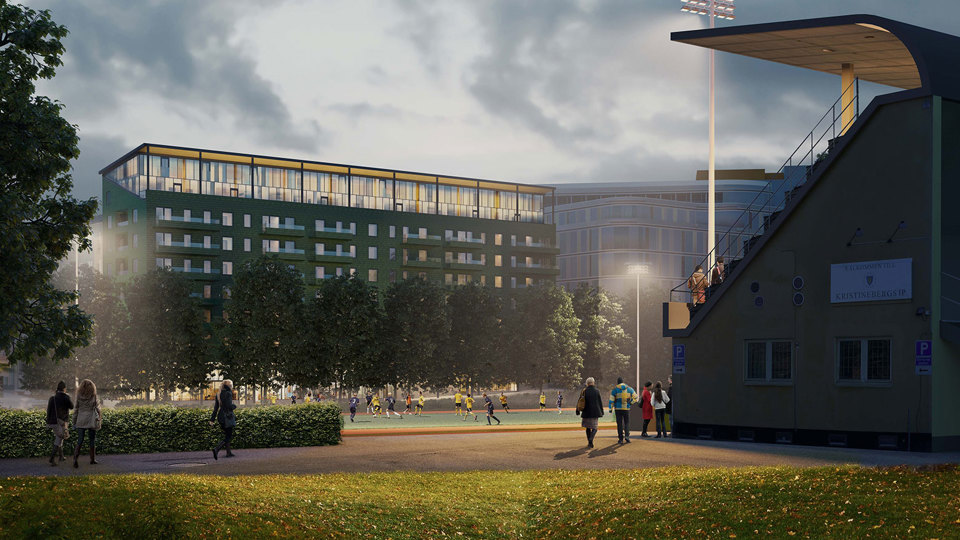 Idrottsplats där barn är i rörelse, läktare. Bakom idrottsplatsen syns ett flerbostadshus, illustration.