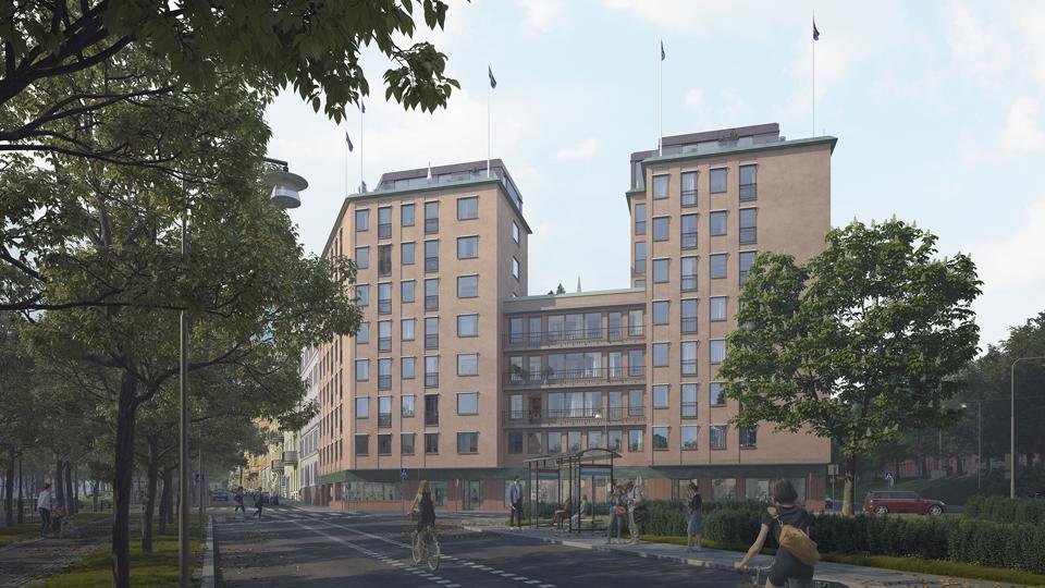 Flerbostadshus sett från marknivå med träd, gata och cyklister. 