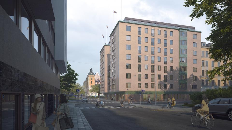 Flerbostadshus sett från marknivå, gata och folk i rörelse. 