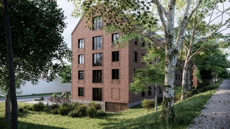 Visionsbild av hus B:s södra gavel. Bilden visar garageinfarten med utvändig ramp. 