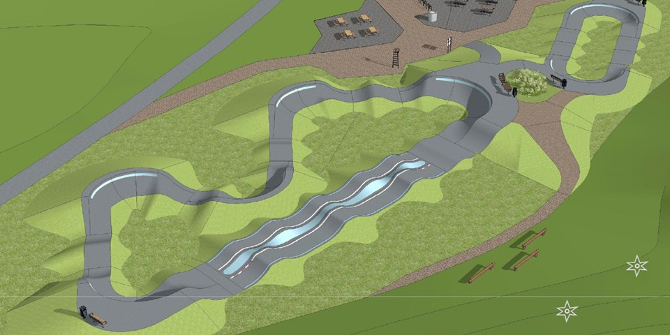 Asfaltsbana i oval form med höjdskillnader, omgivande grönområde, illustration.
