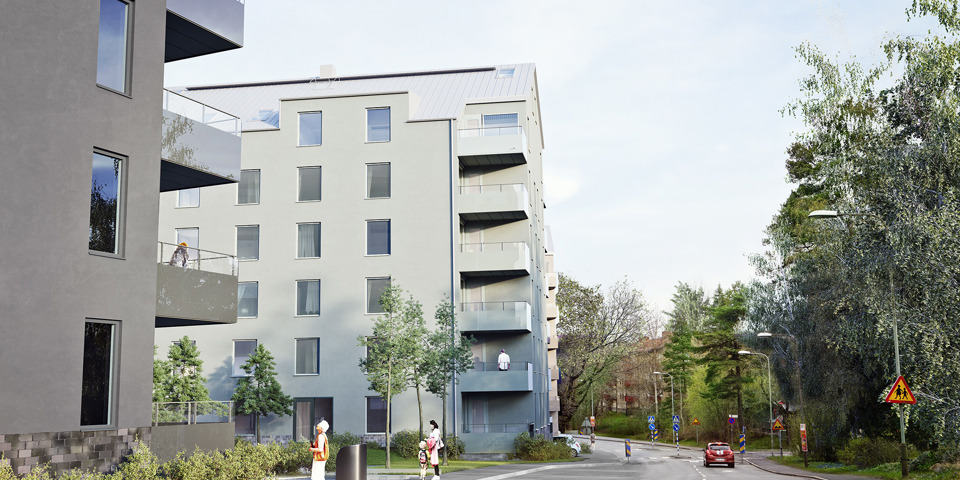 Bostadshus längs en lätt trafikerad gata.