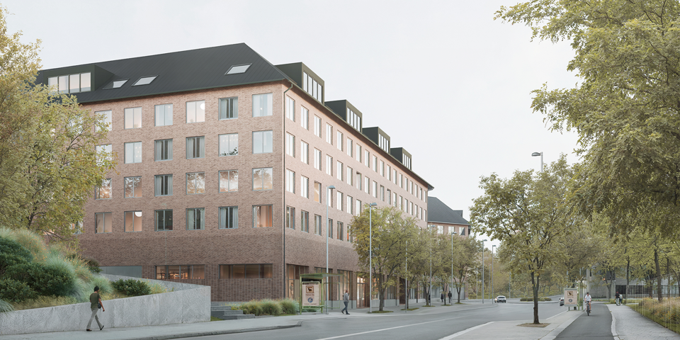 Flervåningshus i tegel längs en gata med trädplanteringar. 