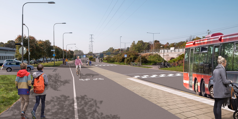 Cykelbana vid skola. Människor som promenerar och cyklar. Buss som kör på bilväg och bil parkerad. Visionsbild.