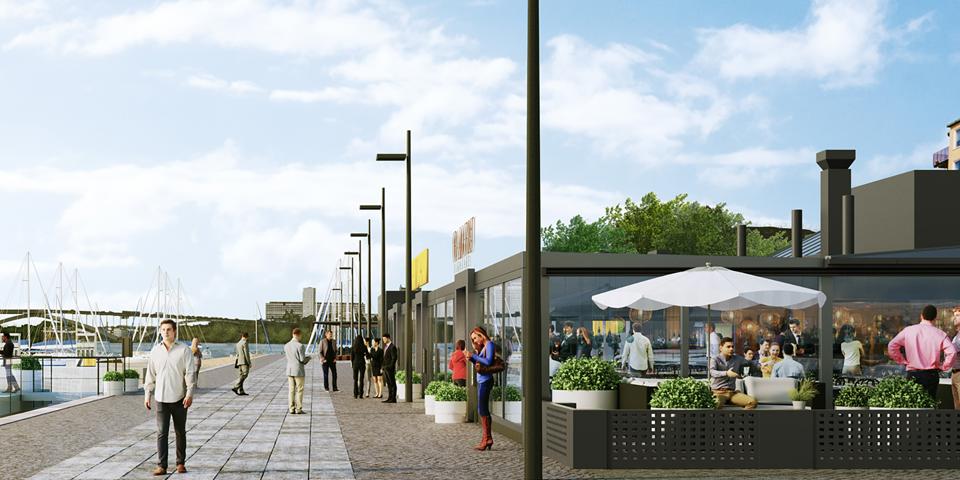 Restauranger som ligger vid vattnet. Människor som är på restaurangerna och som promenerar på kajen. Visionsbild.