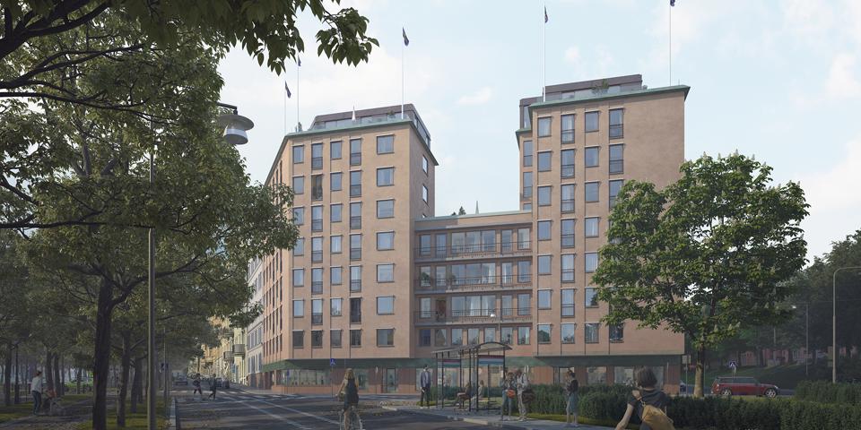 Flerbostadshus sett från marknivå med träd, gata och cyklister. 