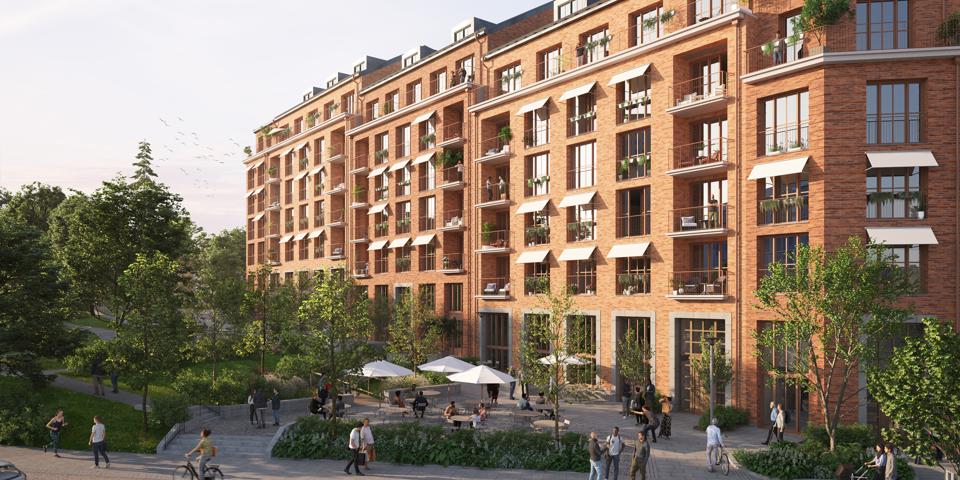Bild av det nya bostadskvarteret med folk som använder de allmänna ytorna. 