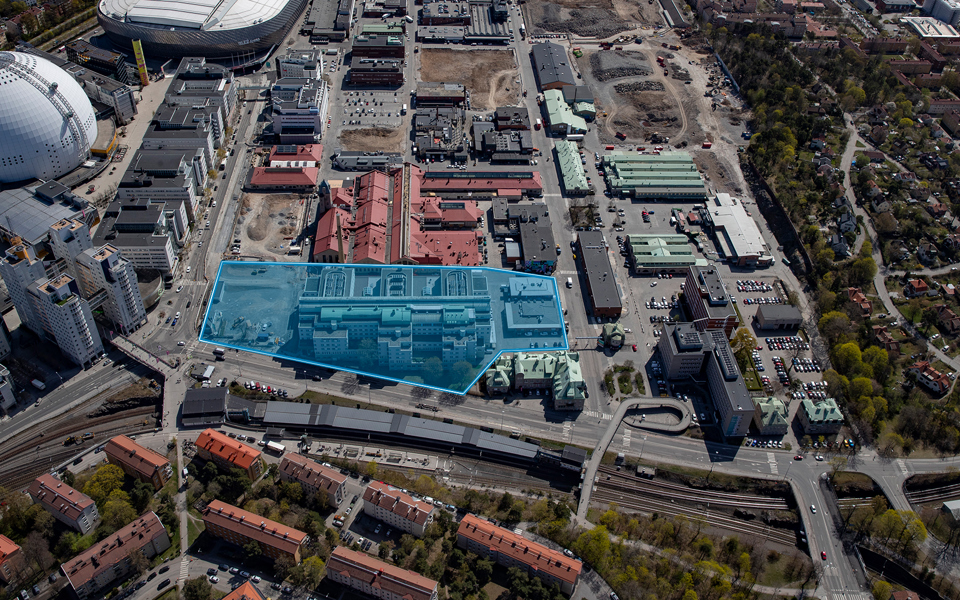 Flygbild över Slakthusområdet med etapp 2E markerad i blått.
