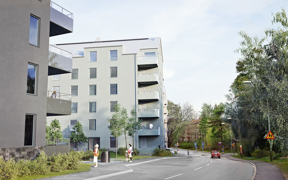 Bostadshus längs en lätt trafikerad gata.