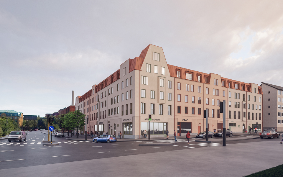 Ett ljust putsat flerbostadshus i hörnet av en korsning. Huset har orangerött plåttak som går ner över de översta fönstren. I korsningen har huset en uppstickande del som ett gavelmotiv. I bottenvåning finns verksamhetslokaler, på visionsbilden står exempelskyltning ovanför lokalerna.