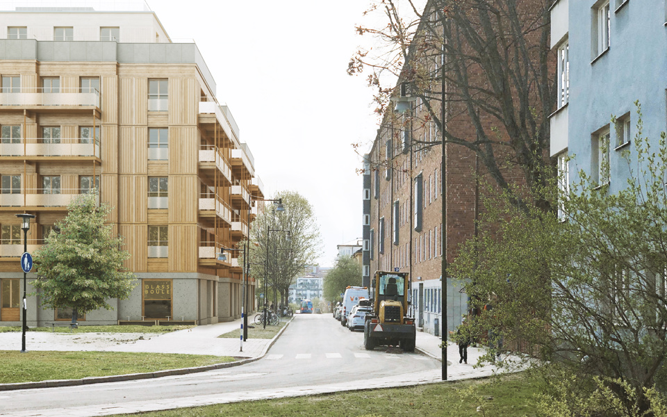 Vy längs med gata med omgivande bostadshus i stadsmiljö, fotomontage.